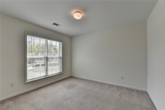 580 Hammersmith Dr, Suwanee, GA 30024 - spare room featuring light colored carpet and baseboards