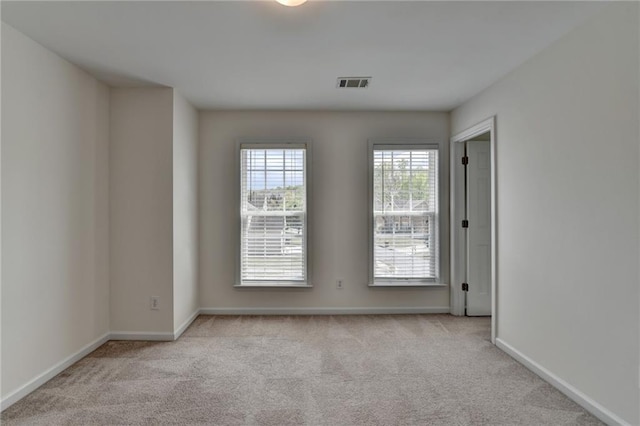 580 Hammersmith Dr, Suwanee, GA 30024 - carpeted spare room featuring baseboards