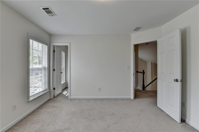 580 Hammersmith Dr, Suwanee, GA 30024 - carpeted spare room with baseboards