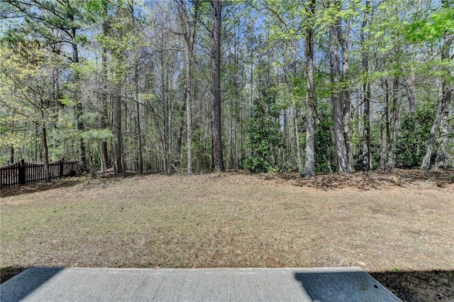 580 Hammersmith Dr, Suwanee, GA 30024 - view of yard featuring a forest view