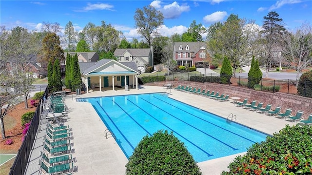 580 Hammersmith Dr, Suwanee, GA 30024 - community pool featuring a patio and a residential view
