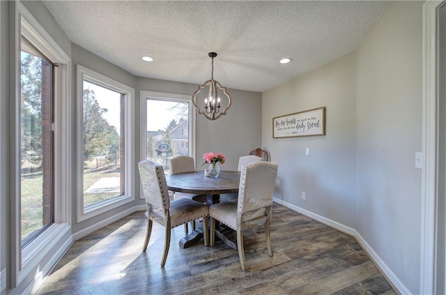 317 Shenandoah Dr NE, Calhoun, GA 30701 - dining room featuring baseboards, a textured ceiling, a chandelier, dark wood-type flooring, and recessed lighting