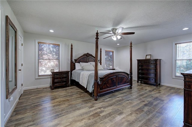 317 Shenandoah Dr NE, Calhoun, GA 30701 - bedroom featuring wood finished floors, baseboards, recessed lighting, a textured ceiling, and a ceiling fan
