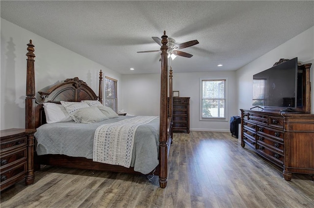 317 Shenandoah Dr NE, Calhoun, GA 30701 - bedroom with wood finished floors, ceiling fan, baseboards, recessed lighting, and a textured ceiling