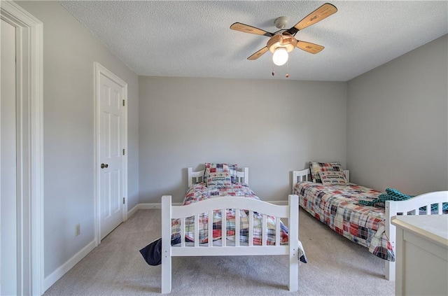 317 Shenandoah Dr NE, Calhoun, GA 30701 - carpeted bedroom with a textured ceiling, ceiling fan, and baseboards