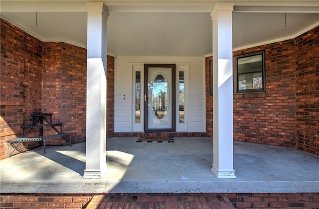 317 Shenandoah Dr NE, Calhoun, GA 30701 - entrance to property featuring covered porch and brick siding