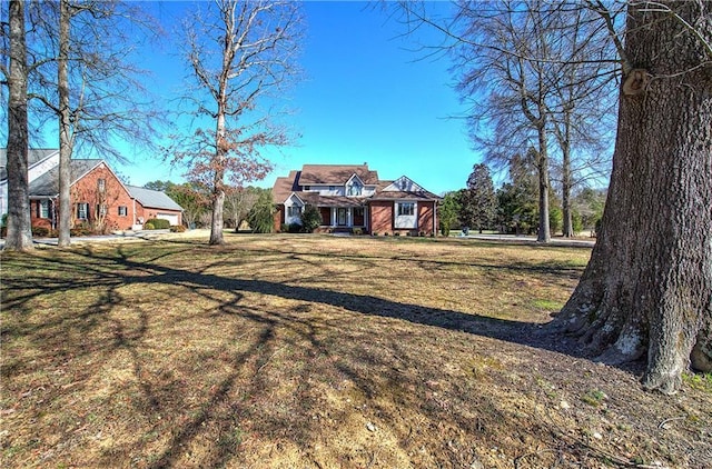 317 Shenandoah Dr NE, Calhoun, GA 30701 - view of front facade with a front lawn