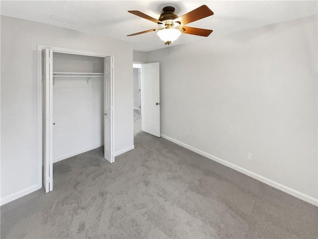 unfurnished bedroom featuring carpet floors, a closet, and ceiling fan