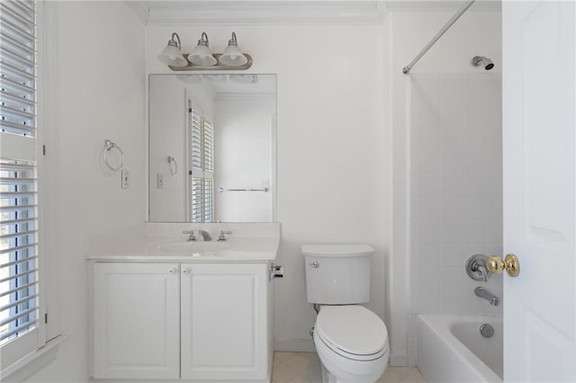 bathroom featuring a wealth of natural light, toilet, ornamental molding, bathtub / shower combination, and vanity