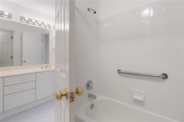 bathroom featuring vanity and washtub / shower combination