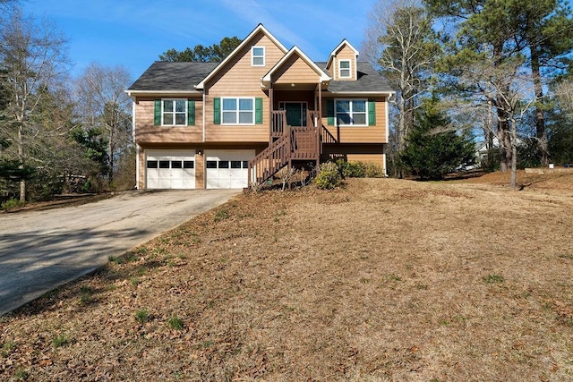 view of front of home with a garage