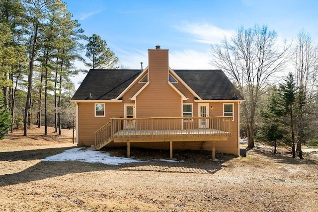 rear view of property with a deck