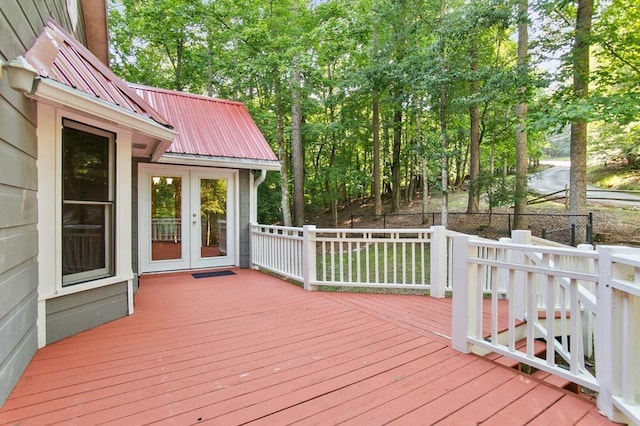 wooden deck featuring french doors