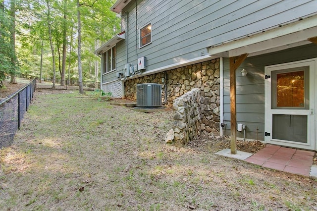 view of yard with central AC