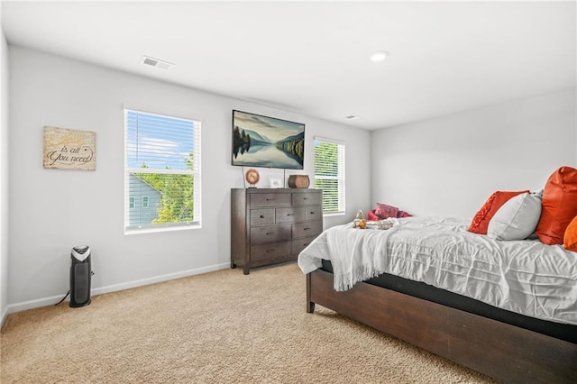 3135 Ellenton Dr, Lithia Springs, GA 30122 - carpeted bedroom with baseboards and visible vents