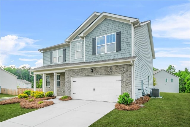 3135 Ellenton Dr, Lithia Springs, GA 30122 - view of front of property featuring an attached garage, a front lawn, brick siding, central AC unit, and driveway