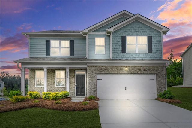 3135 Ellenton Dr, Lithia Springs, GA 30122 - view of front of home with an attached garage, a lawn, driveway, and brick siding