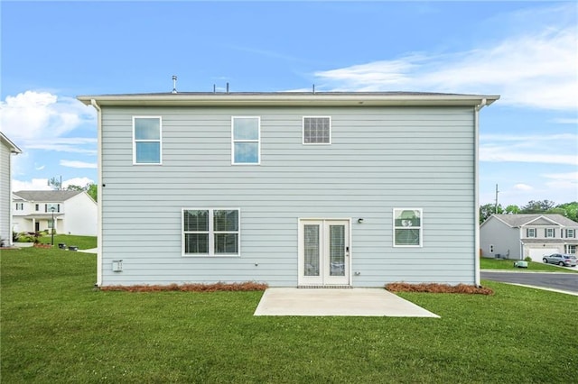 3135 Ellenton Dr, Lithia Springs, GA 30122 - rear view of property with a yard and a patio area