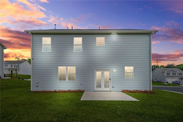 3135 Ellenton Dr, Lithia Springs, GA 30122 - rear view of property with a patio and a yard