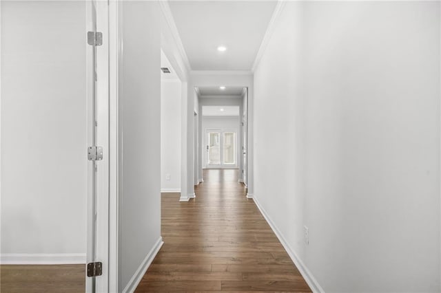 3135 Ellenton Dr, Lithia Springs, GA 30122 - hallway with dark wood-style flooring, visible vents, crown molding, baseboards, and recessed lighting