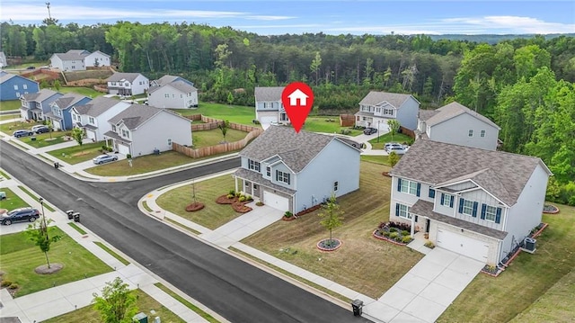 3135 Ellenton Dr, Lithia Springs, GA 30122 - aerial view with a residential view and a forest view