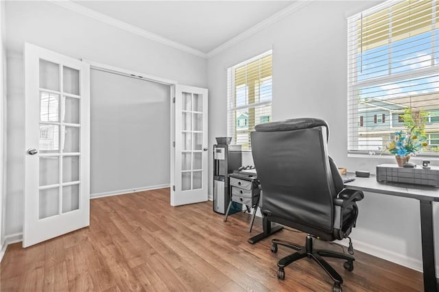 3135 Ellenton Dr, Lithia Springs, GA 30122 - office featuring crown molding, baseboards, french doors, and wood finished floors