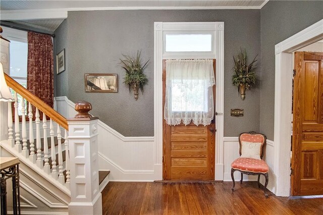 entryway with dark wood-type flooring