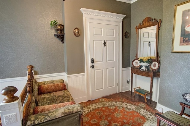 entryway with dark hardwood / wood-style flooring