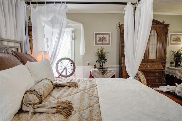 bedroom with ornamental molding