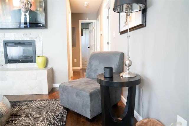 284 Barfield Ave SW, Atlanta, GA 30310 - sitting room with baseboards, wood finished floors, and a glass covered fireplace