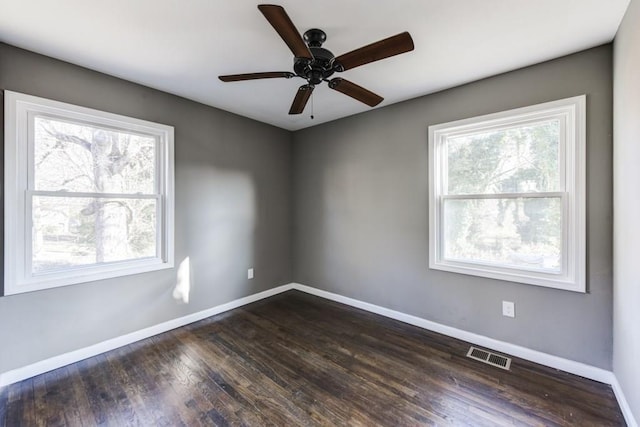 284 Barfield Ave SW, Atlanta, GA 30310 - unfurnished room with baseboards, dark wood-type flooring, and a ceiling fan