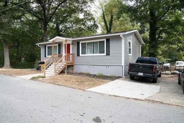 284 Barfield Ave SW, Atlanta, GA 30310 - view of front of home featuring view of wooded area and crawl space