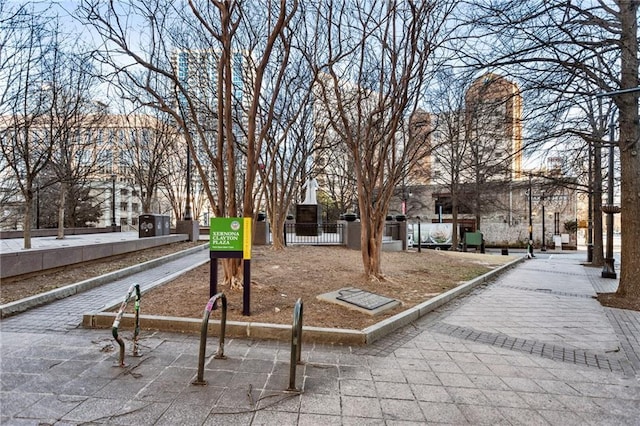 view of community featuring fence