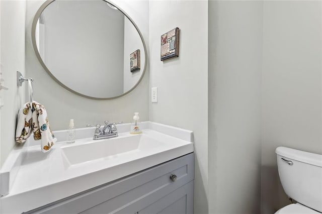 5415 Fieldfreen Dr, Cumming, GA 30028 - half bathroom featuring toilet and vanity