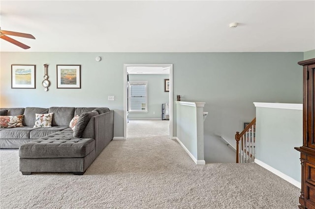 5415 Fieldfreen Dr, Cumming, GA 30028 - living area featuring a ceiling fan, carpet, and baseboards