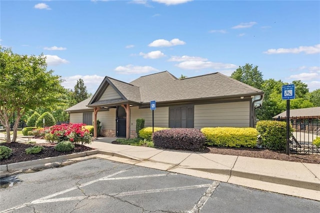 5415 Fieldfreen Dr, Cumming, GA 30028 - view of front facade featuring uncovered parking and a shingled roof