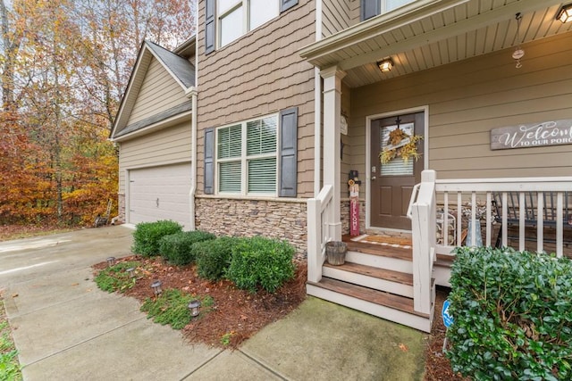 doorway to property featuring a garage