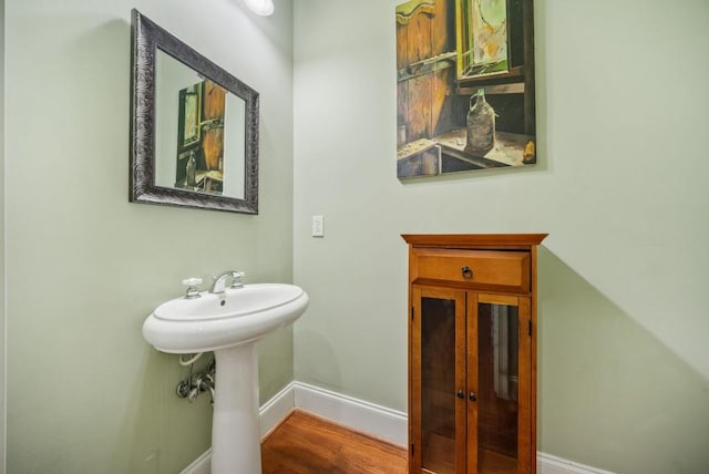 bathroom featuring hardwood / wood-style flooring