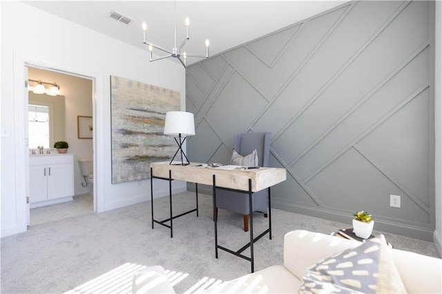 home office with a chandelier, light colored carpet, a sink, visible vents, and baseboards