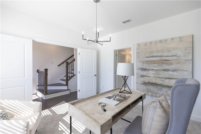 home office featuring a chandelier, dark wood-style flooring, and visible vents