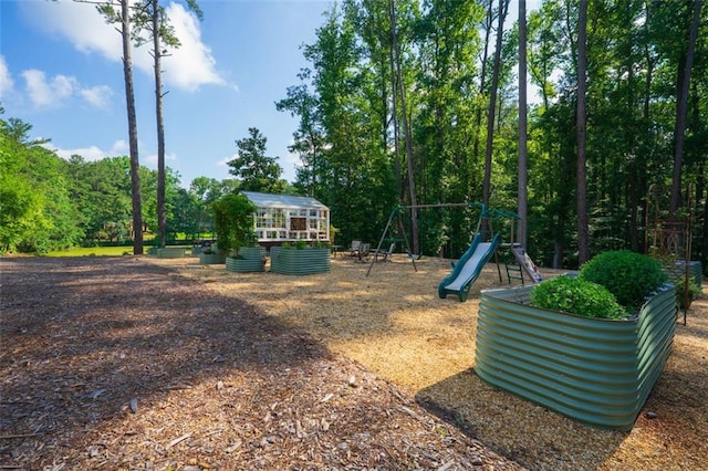 1382 Varner Rd, Marietta, GA 30062 - view of yard with a vegetable garden and an outdoor structure