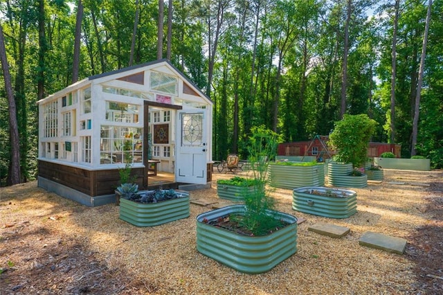 1382 Varner Rd, Marietta, GA 30062 - view of greenhouse with a garden