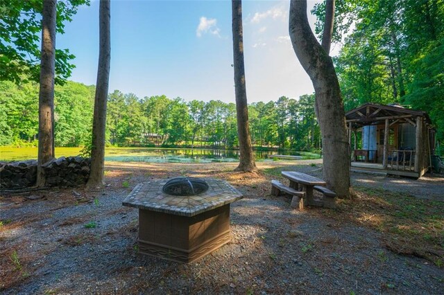 1382 Varner Rd, Marietta, GA 30062 - view of yard featuring a fire pit and a gazebo
