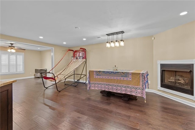 rec room featuring ceiling fan and wood-type flooring