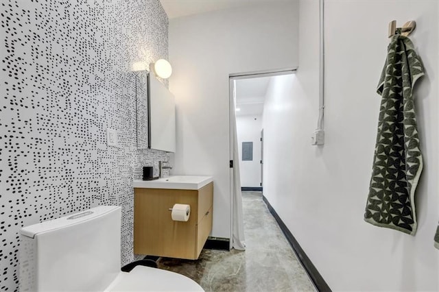 bathroom with vanity and toilet