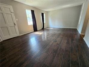 interior space featuring dark wood-type flooring