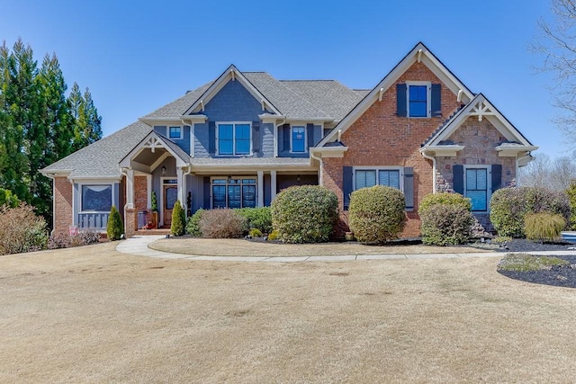 486 Gold Bullion Dr E, Dawsonville, GA 30534 - craftsman house with brick siding and roof with shingles
