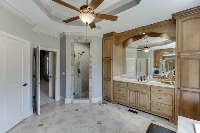 486 Gold Bullion Dr E, Dawsonville, GA 30534 - bathroom featuring a tray ceiling, a ceiling fan, a shower stall, vanity, and ornamental molding