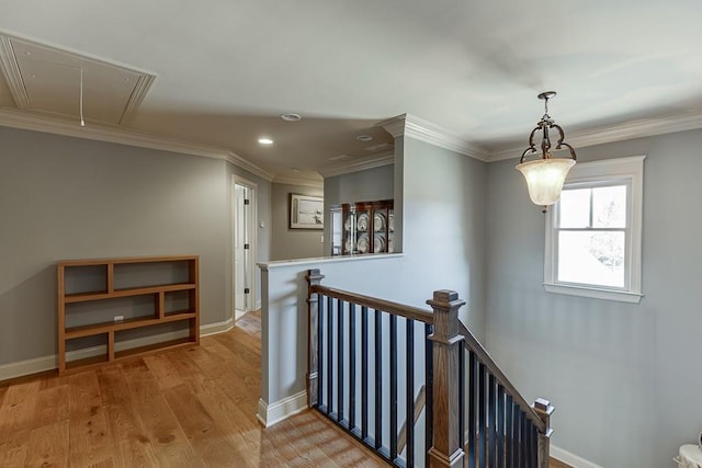 486 Gold Bullion Dr E, Dawsonville, GA 30534 - corridor with an upstairs landing, attic access, recessed lighting, light wood finished floors, and crown molding