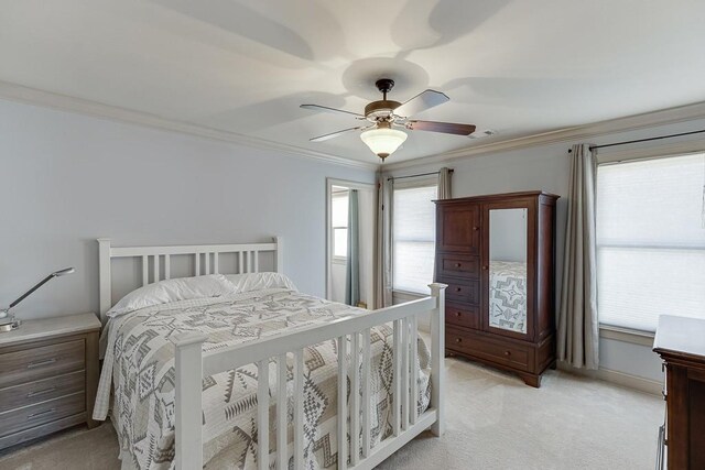 486 Gold Bullion Dr E, Dawsonville, GA 30534 - bedroom with light carpet, ornamental molding, ceiling fan, and baseboards